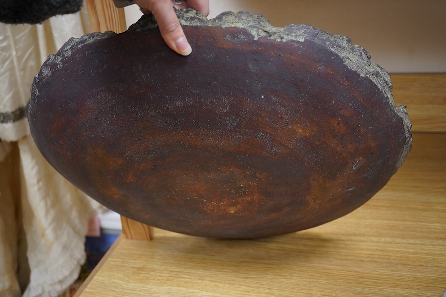 Dennis Fairweather, a large studio pottery flat dish with rough edges, 47cm wide